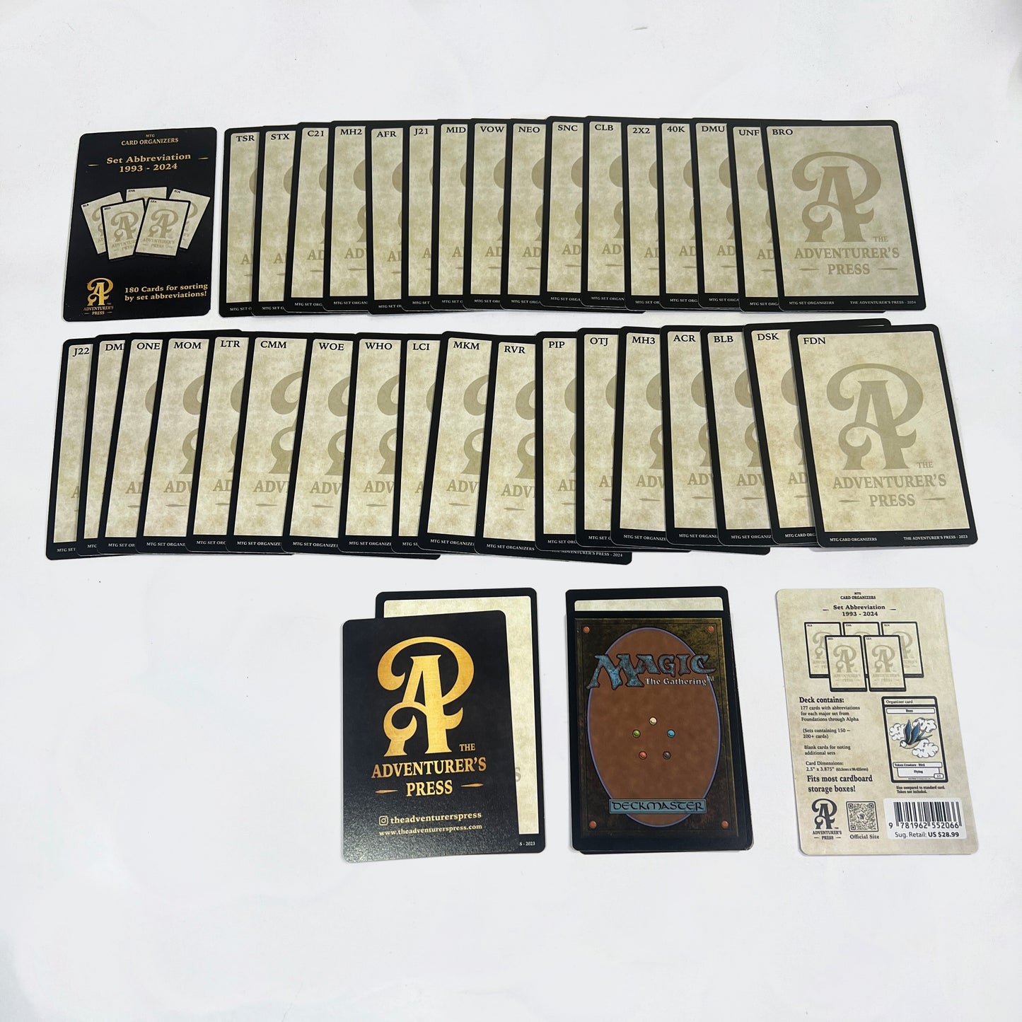 Image of Set Organizer cards for magic the gathering laid out on a white background and traditional Magic Card for scale